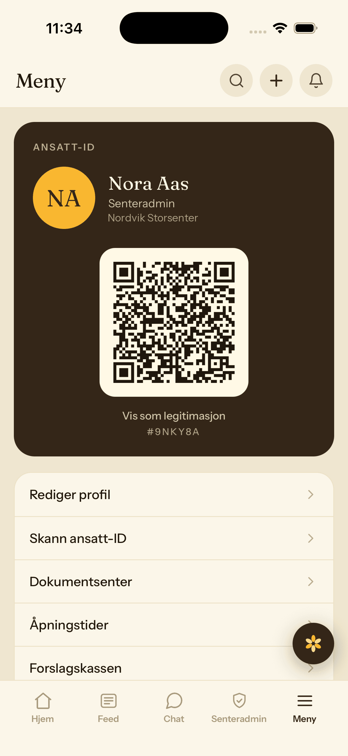 A staff ID in Torget showing the employee's name and a QR code for check-in